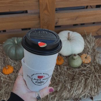 Village House Coffee - a hand holding a cup of coffee - Bakeries Near Me - Georgetown, Indiana Village House Coffee - a hand holding a cup of coffee - Bakeries Near Me - Georgetown, Indiana