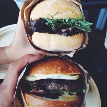 Eggslut - Gaucho on top and Eggslut cheeseburger with bacon and avocado on the bottom - Breakfast & Brunch Near Me - Los Angeles, California
