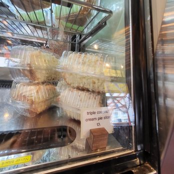 Dahlia Bakery - Triple coconut cream pie slice ($13). Quite pricey. 3/29/2023 - Bakeries Near Me - Seattle, Washington