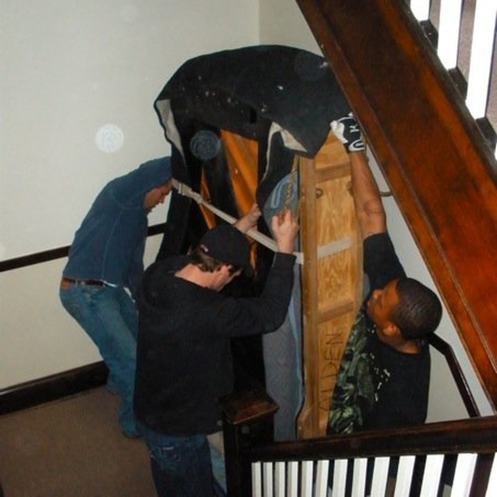 Alden's Piano - Standing it up to make the turn. - Piano Services Near Me - Waukegan, Illinois Alden's Piano - Standing it up to make the turn. - Piano Services Near Me - Waukegan, Illinois