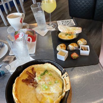 Apt 9f - Savory Dutch Baby and Beef Wellington.  Delicious - Cocktail Bars Near Me - Wilton Manors, Florida