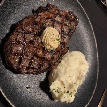 Club Prive - Ribeye Steak (Med Rare) mashed Potatoes - New American Near Me - Canton, Ohio Club Prive - Ribeye Steak (Med Rare) mashed Potatoes - New American Near Me - Canton, Ohio