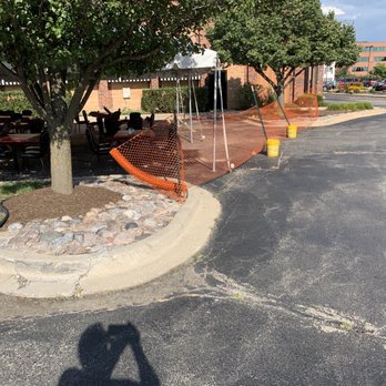 Jimmy's Charhouse - Ugly fence ran all the way to the curb allowing no access for the challenged. - Steakhouses Near Me - Elgin, Illinois