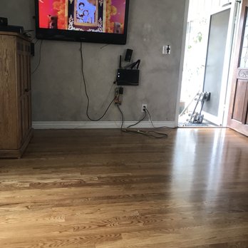 Gamboa's Flooring - a flat screen tv in a living room - General Contractors Near Me
