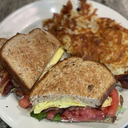 The Egg Bistro - BLT with Scrambled Eggs and Pepper-Jack Cheese, served with Crispy Hash Browns and a side of Stone Ground Grits!