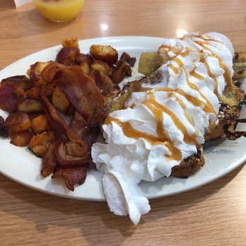 Eggs Up Grill - Banana Bananas Foster French Toast,home fries, bacon.........awesomeness - Breakfast & Brunch Near Me - Rock Hill, South Carolina Eggs Up Grill - Banana Bananas Foster French Toast,home fries, bacon.........awesomeness - Breakfast & Brunch Near Me - Rock Hill, South Carolina