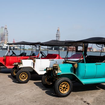 Carriage Haus - 5-Seater and 8-Seater Replica Model-T Electric Golf Carts for Rent! - Golf Cart Rentals Near Me - Galveston, Texas Carriage Haus - 5-Seater and 8-Seater Replica Model-T Electric Golf Carts for Rent! - Golf Cart Rentals Near Me - Galveston, Texas