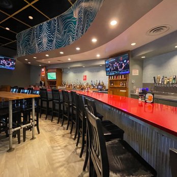 Mellow Mushroom Knoxville - a bar with red counter top - Pizza Near Me - Knoxville, Tennessee Mellow Mushroom Knoxville - a bar with red counter top - Pizza Near Me - Knoxville, Tennessee