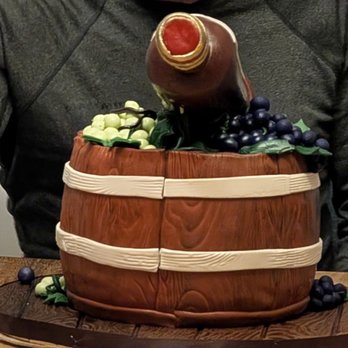 Lavender Bakery & Cafe' - custom 8-inch 4-layer chocolate cake with chocolate buttercream and thin layers of raspberry filling - Cafes Near Me - Berkeley, California