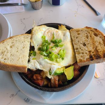 Toasted Del Mar - Smoked Brisket Hash with Poached Eggs & Sourdough Toast (5/5) - Breakfast & Brunch Near Me - San Diego, California Toasted Del Mar - Smoked Brisket Hash with Poached Eggs & Sourdough Toast (5/5) - Breakfast & Brunch Near Me - San Diego, California