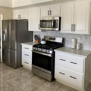 Flooring Mart - After Photo: Painted cabinets, new cabinet/drawer pulls, new sink & faucet, new quartz countertop, new backsplash. - Flooring Near Me - Upland, California