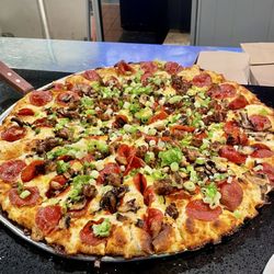Italian Garlic Supreme Pizza- Pepperoni, Italian sausage, tomatoes, mushrooms, green onions, garlic with Creamy Garlic Sauce