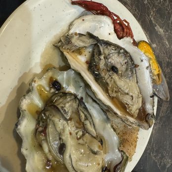 Tin Tin Buffett - three oysters on a plate - Buffets Near Me - Portland, Oregon Tin Tin Buffett - three oysters on a plate - Buffets Near Me - Portland, Oregon