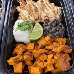 Flava Meal Prep - Beauty and Beast Bowl, with barbecue shredded chicken, black beans, sweet potato fries, rice and Chipotle Aioli!