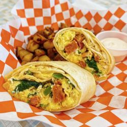 Painted Baker Cafe - Tractor Beam burrito with linguica and a side of sirracha sour cream