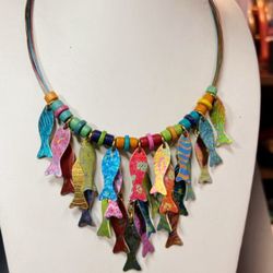 Art Expo Custom Framing Gallery - Lightweight, colorful aluminum fish necklace and jewelry