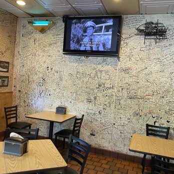 Bullies BBQ - a tv mounted on the wall - Barbeque Near Me - Hilton Head Island, South Carolina Bullies BBQ - a tv mounted on the wall - Barbeque Near Me - Hilton Head Island, South Carolina