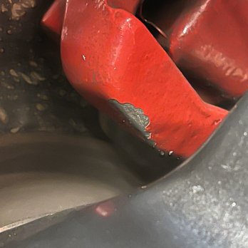 Discount Tire - Caliper damage from wheel smashing into the caliper upon reinstallation - Tires Near Me - Schaumburg, Illinois