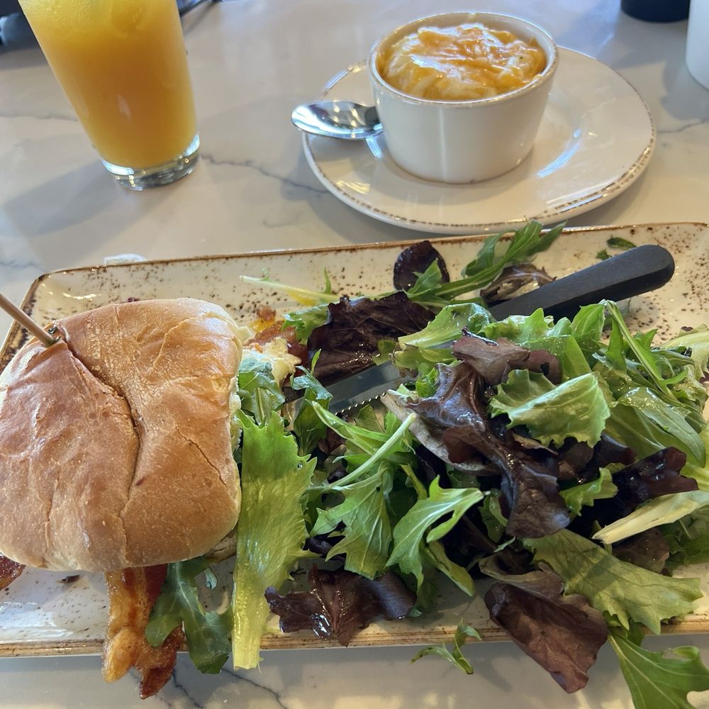 First Watch - Breakfast sandwich & salad with a side of grits - Breakfast & Brunch Near Me - Mooresville, North Carolina First Watch - Breakfast sandwich & salad with a side of grits - Breakfast & Brunch Near Me - Mooresville, North Carolina