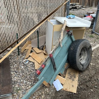 Junk King Albuquerque - 2nd pile of debris and long pallet at 222 Monclaire Dr SE, 87108 - Junk Removal & Hauling Near Me - Albuquerque, New Mexico