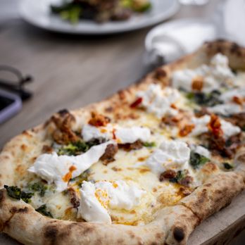 Nodo Liberty - Pianezza Marinated artichoke, roasted red pepper, creamy goat cheese, basil pesto (with light mozzarella) - Italian Near Me - Toronto, Ontario
