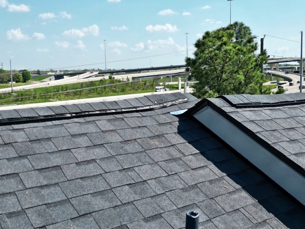 Slide of Whatley Roofing