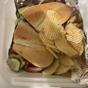 Wrigley Field Bar & Grill - Grinder sandwich and chips - Bars Near Me - Fort Wayne, Indiana