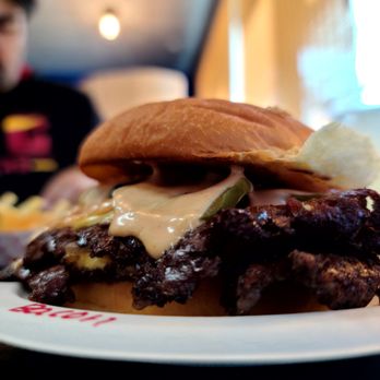 For The Win - a plate of food on a table - Burgers Near Me - Whittier, California