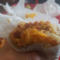 Bacon, egg, potato and cheese breakfast burrito. Bacon & Eggs Bacon, egg, potato and cheese breakfast burrito. Bacon & Eggs