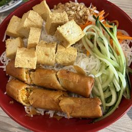 bun with tofu and veggie eggrolls bun with tofu and veggie eggrolls