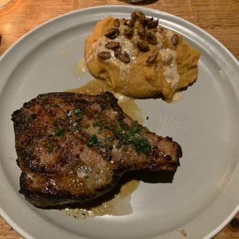 Whiskey Cake - Pork chop and purée sweet potatoes. - New American Near Me - Irving, Texas Whiskey Cake - Pork chop and purée sweet potatoes. - New American Near Me - Irving, Texas