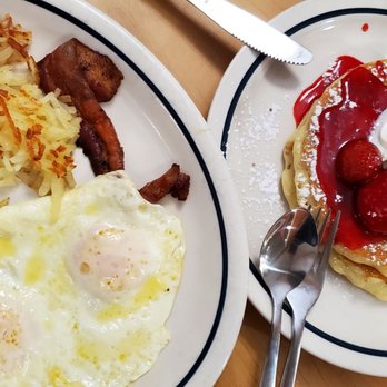 IHOP - two plates of breakfast food on a table - Breakfast & Brunch Near Me - Indianapolis, Indiana