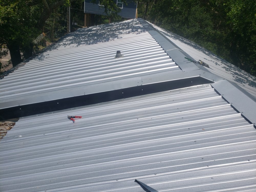 Slide of Conforto Roofing Renovations