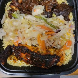 Salmon over rice and veggies. Salmon over rice and veggies.