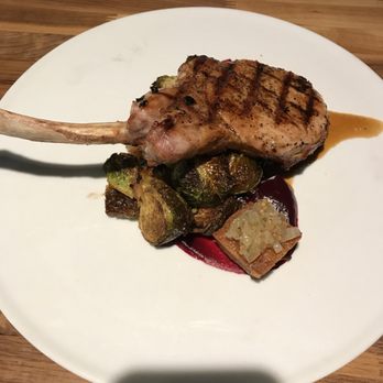 Branca Midtown - Pork chop with Brussels sprouts - Pizza Near Me - Rochester, New York