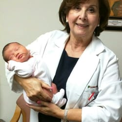 Haifa S Al-Azawi, MD - Dr, Azawi and my baby daughter, 1 week after delivery!