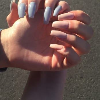 Apple Nail Salon - My nails are the grey ones and my friends are the pink ones. Loved mine, but unfortunately my friends came off within a week :/ - Nail Salons Near Me - Cerritos, California
