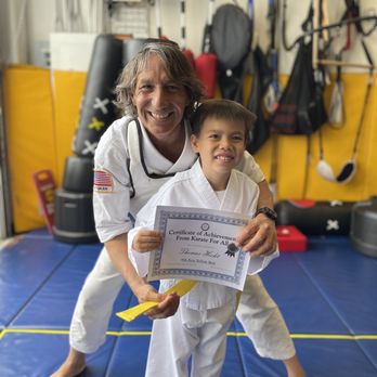 Karate For All - Sensei Wayne and my son after his yellow belt promotion. - Karate Near Me - Tustin, California