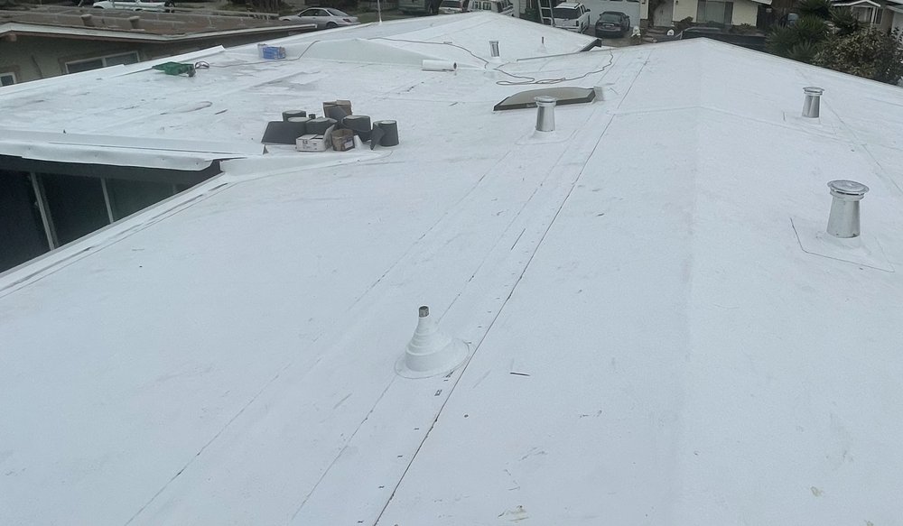 Slide of RECO Roofing