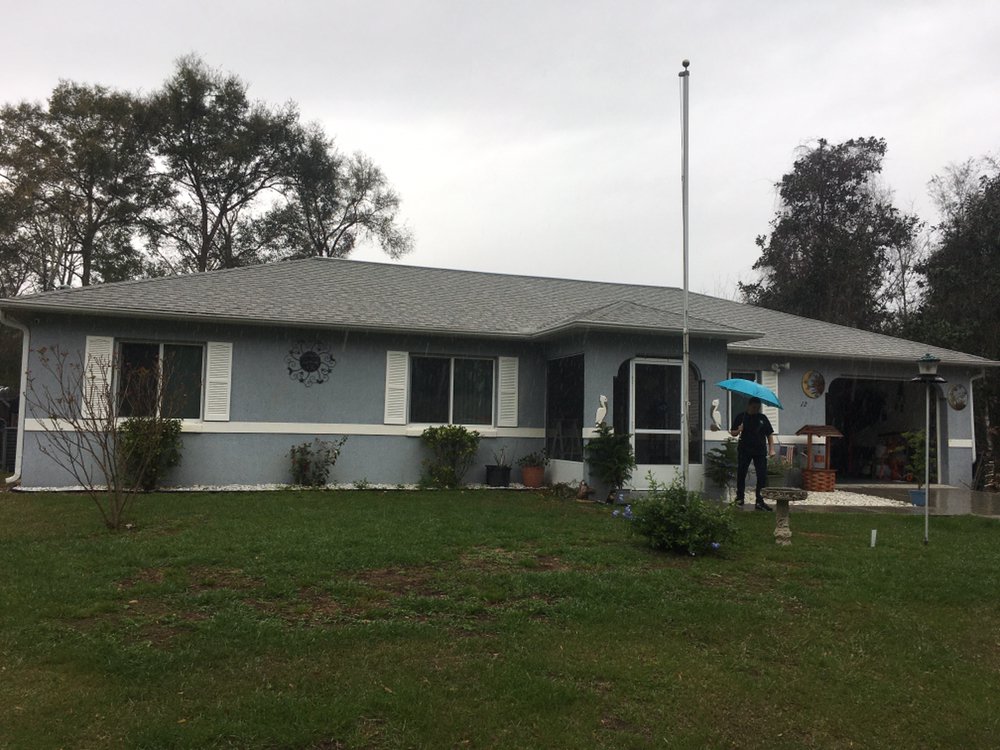 Slide of Gallagher Roof Cleaning