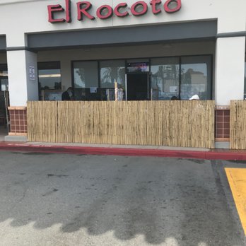 El Rocoto - The dining area is behind the fence, cozy comfy. - Peruvian Near Me - Gardena, California El Rocoto - The dining area is behind the fence, cozy comfy. - Peruvian Near Me - Gardena, California