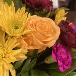 Mandarin Orchid House - Freshly delivered flowers that are supposed to be a purple arrangement for a birthday.