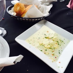 La Famiglia Italian Ristorante & Pizza - Freshly baked bread and garlic dip while we wait for our meal.  Delicious.