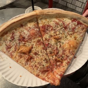 Photo of 2 Bros Pizza - New York, NY, United States. Two regular cheese slice