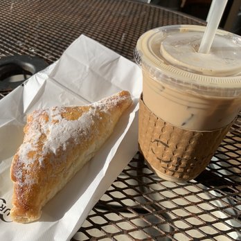Crema Coffee & Bakery - Nutella turnover and English toffee flavored iced latte - Coffee & Tea Near Me - Cary, North Carolina Crema Coffee & Bakery - Nutella turnover and English toffee flavored iced latte - Coffee & Tea Near Me - Cary, North Carolina