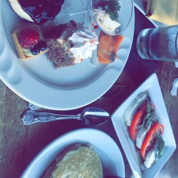 Rusty Pelican - Short Stack Pancakes, Ceviche, Blueberry Cheesecake, Carrot Cake, Salmon, Caprese Salad - Seafood Near Me - Tampa, Florida