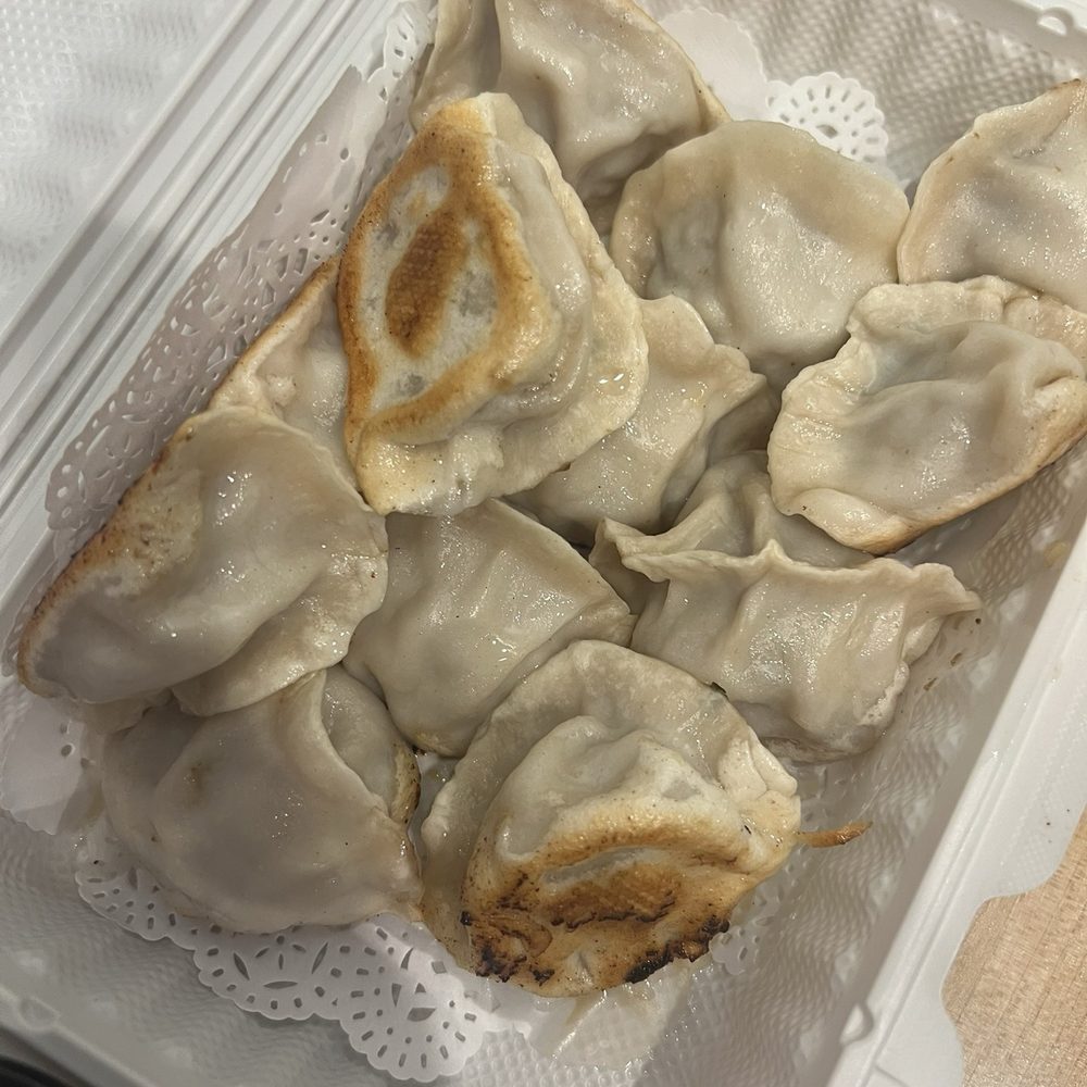 Lao Tian Dumpling House - Lamb & Cilantro Dumplings (pan fried) - Chinese Near Me - Evanston, Illinois Lao Tian Dumpling House - Lamb & Cilantro Dumplings (pan fried) - Chinese Near Me - Evanston, Illinois