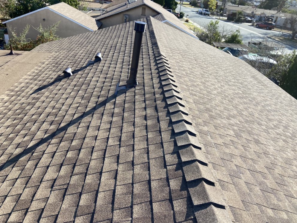 Slide of MRK Roofing Services