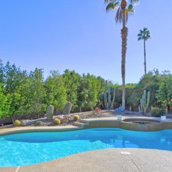 Darci Hope Realtor - Pool with Palm Trees and Cacti