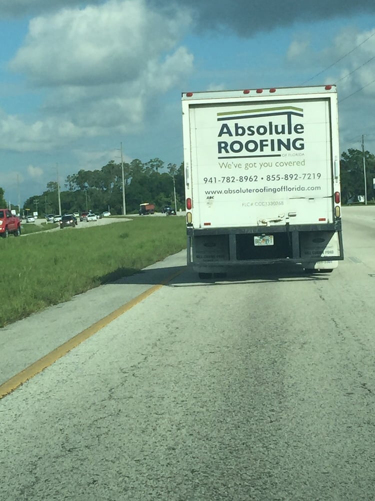 Slide of Absolute Roofing of Florida